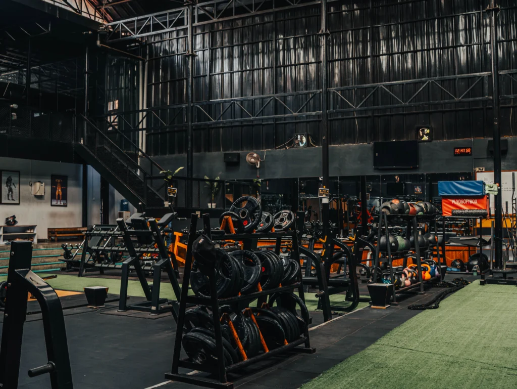 Well-equipped gym floor at Total Physical Fitness Center, the best gym in Baneshwor with strength and functional training equipment.